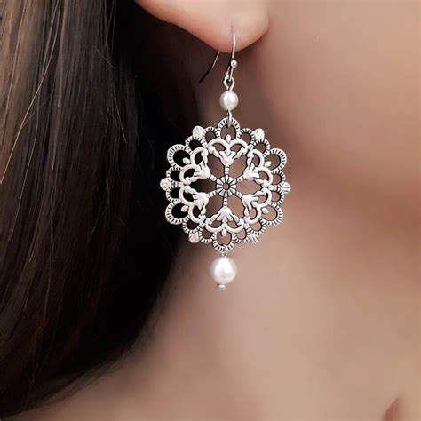 Boucles d'oreilles pour Femme de Luxe .